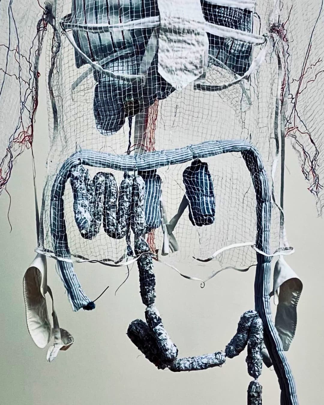 A close up of a sculpture of internal organs hanging in space