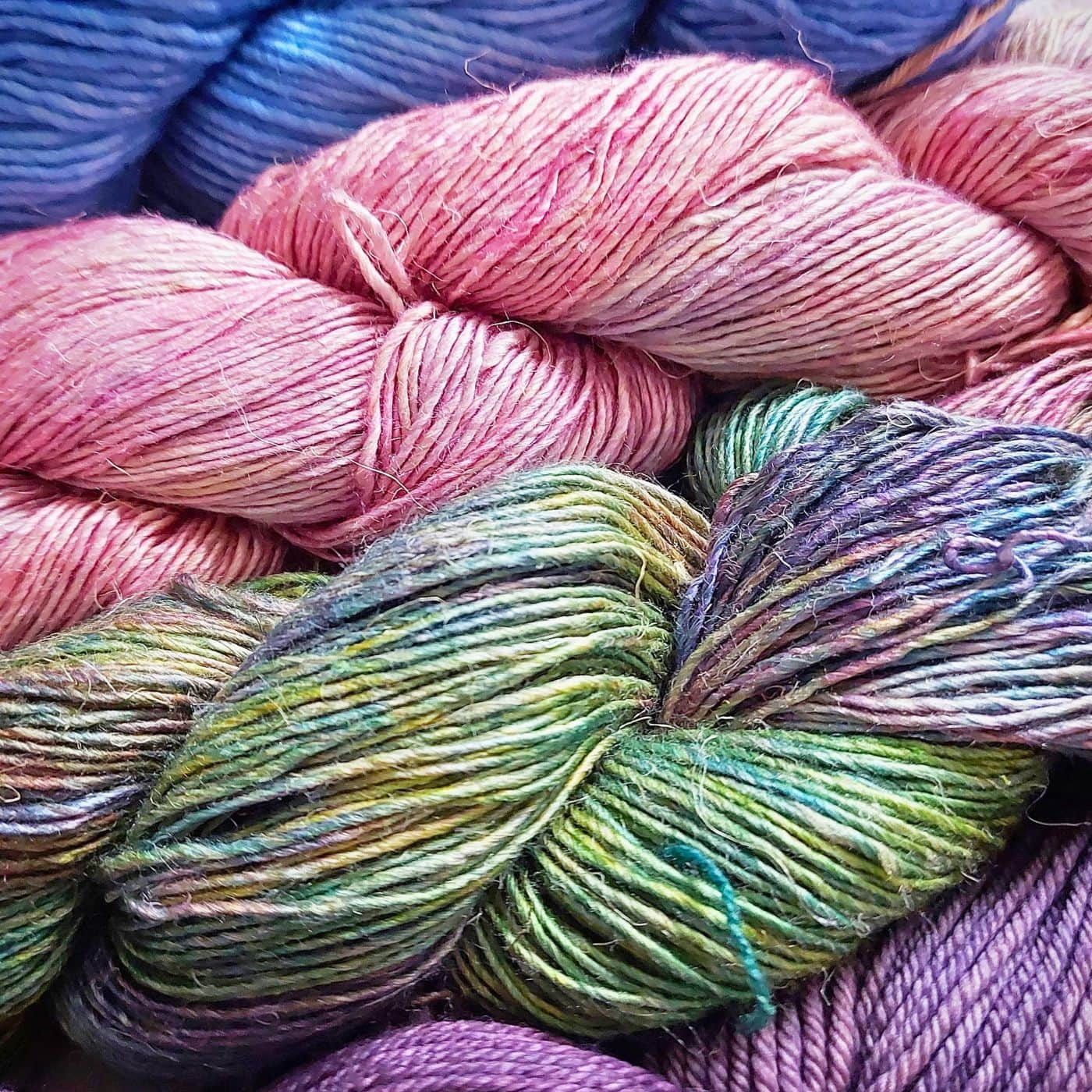 A close up of colourful yarn