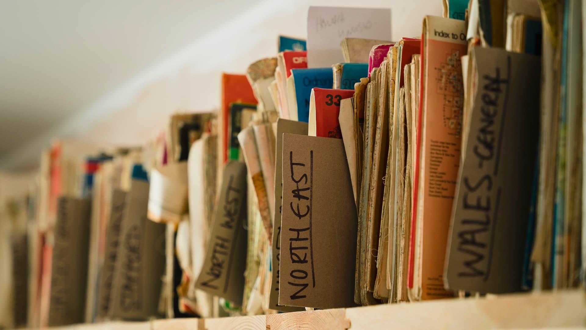 A row of files on a shelf