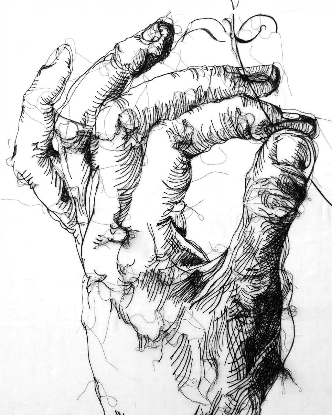 A stitched illustration in black thread on a white cotton background of a large hand holding a needle and thread