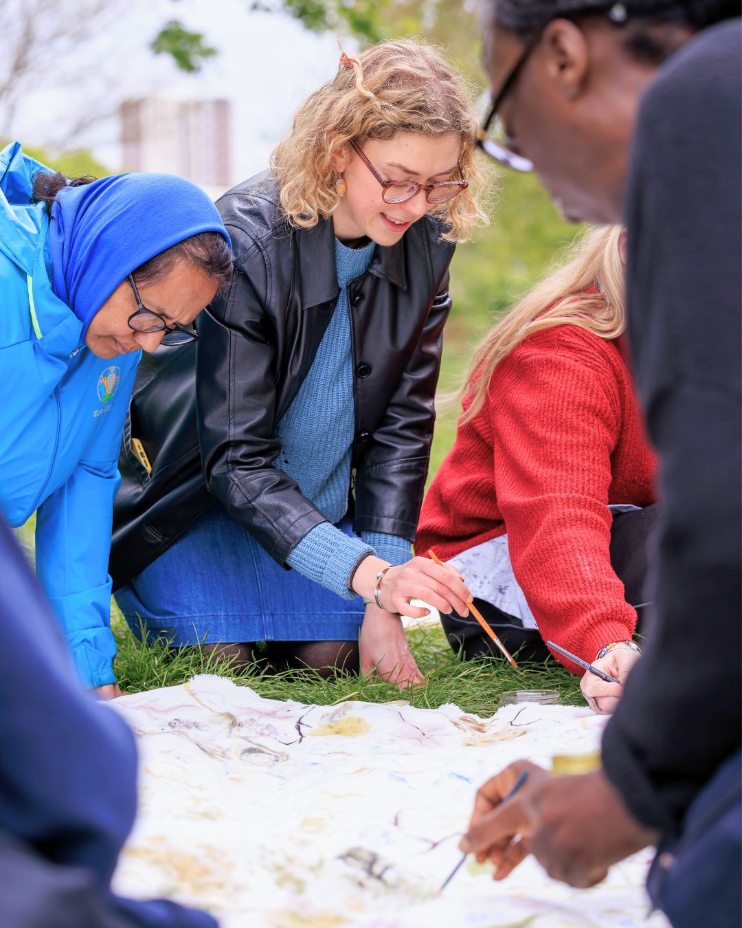 Alice Burnhope and participants at RHS Gardens of Imagination, creating a piece of community art in Lewisham.