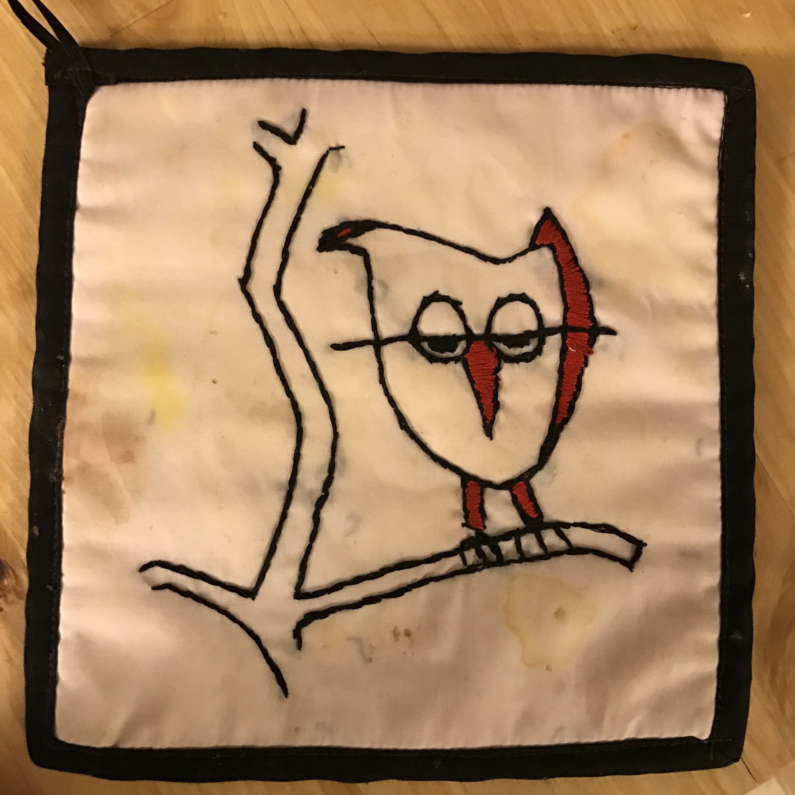 Catherine Hicks: Owl Potholder, Circa 1968, 7” X 7”, Hand embroidery with DMC cotton floss on cotton