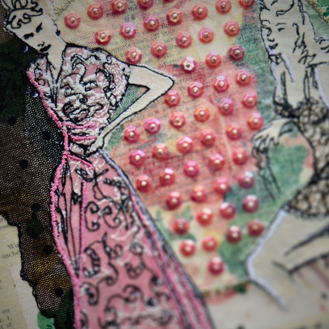 A close up of a fabric artwork of a woman 