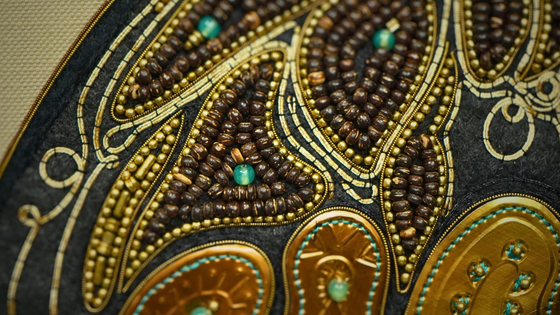 a close up of a beaded design