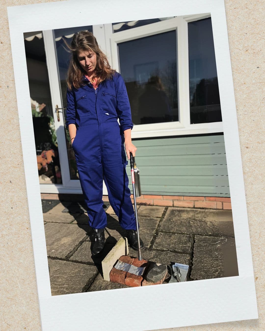 Emma Pannell preparing the aluminium cans outdoors