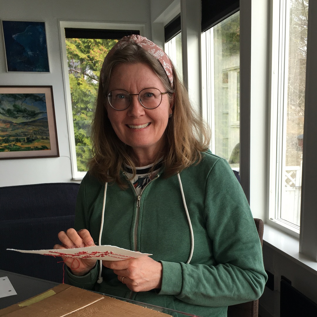 Heléne Forsberg stitching in her studio.