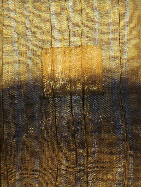 Karen Henderson, Persistent Flicker. Hand woven raw silk and paper, batik, dye & discharge, stitching, and gold leaf. 22”h x 17”w. 2007. Private Collection