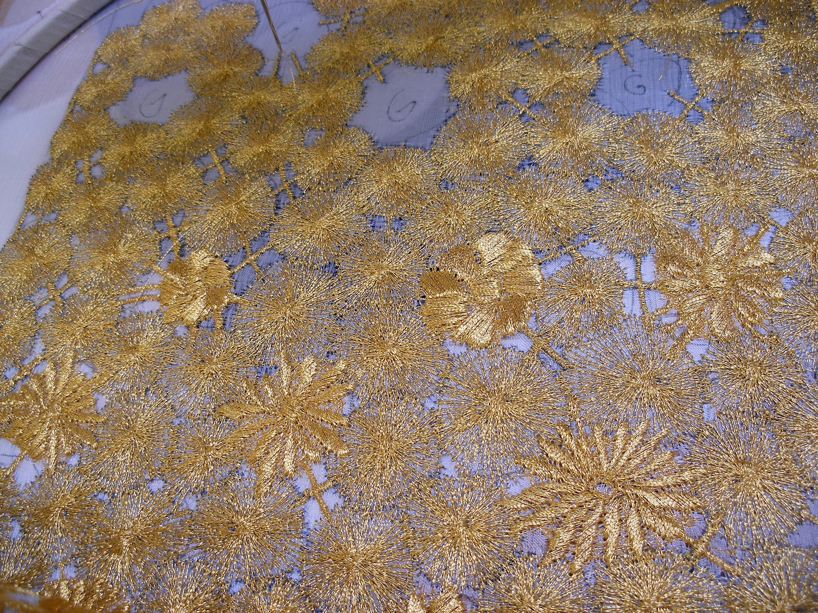 Kate Wells: 'Starburst' details with gold flowers inlaid in spaces between