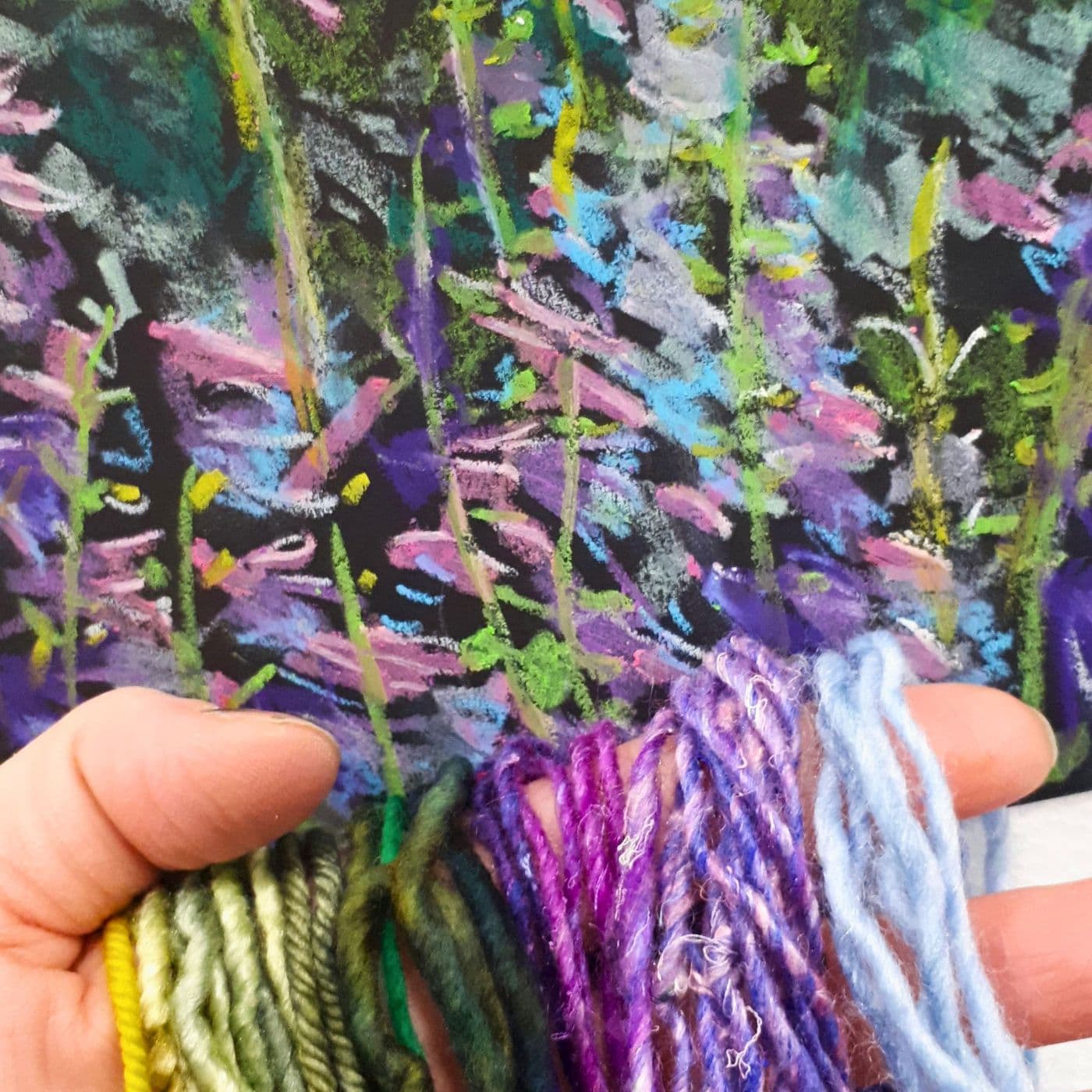 Monika Kinner matching yarns to a sketch.