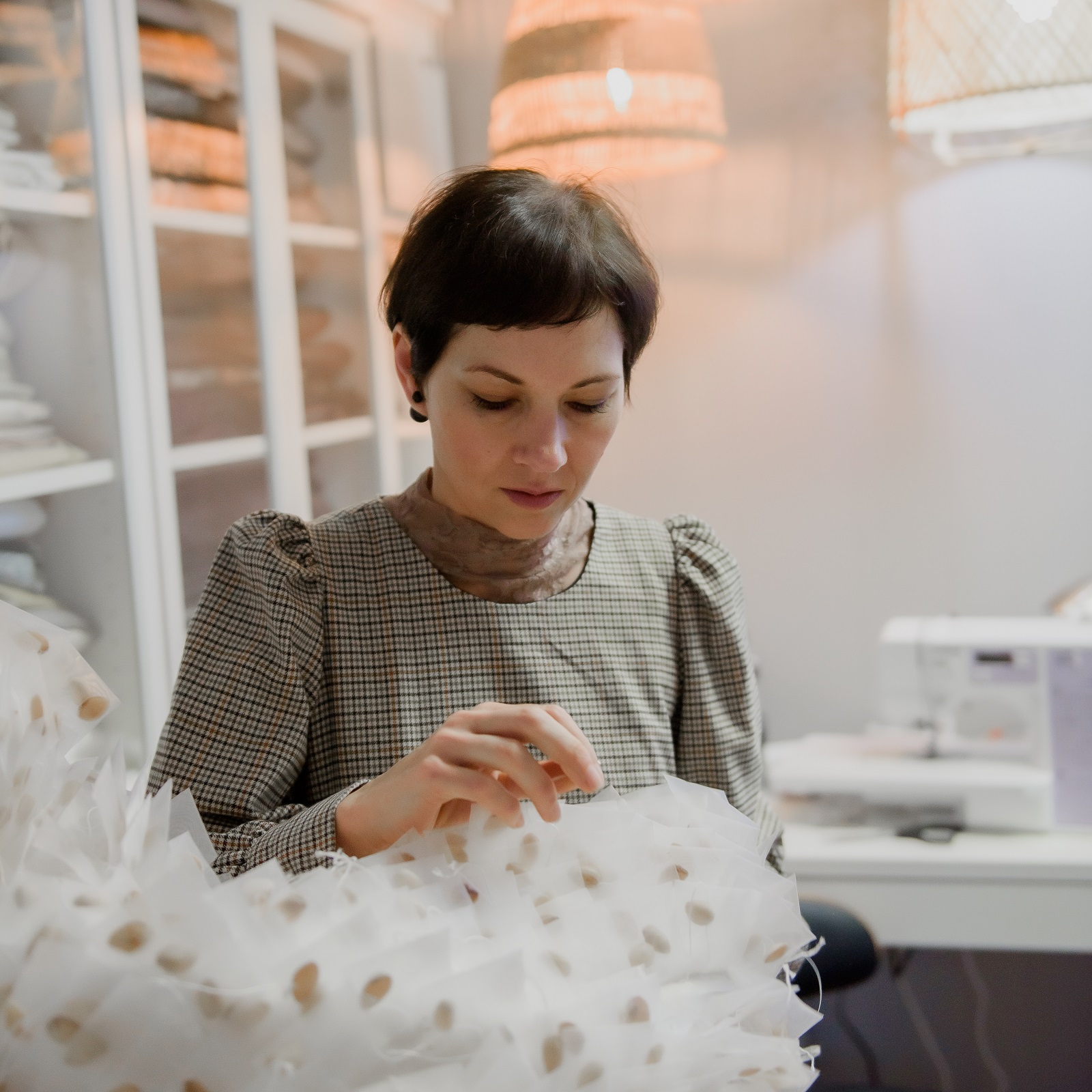 Tina Marais stitching her work Unfold, My Skin. Photo: Myriam Frenette