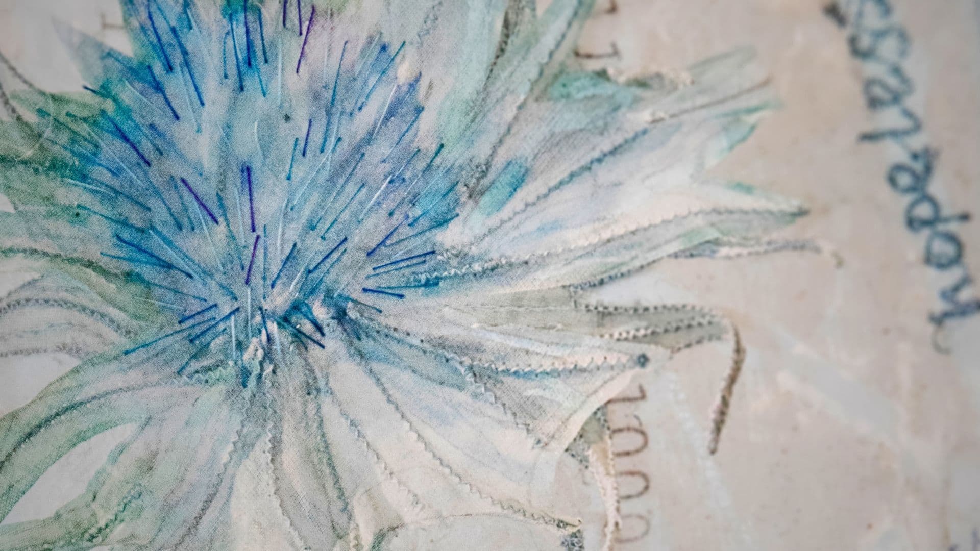 A close up of a delicate flower artwork