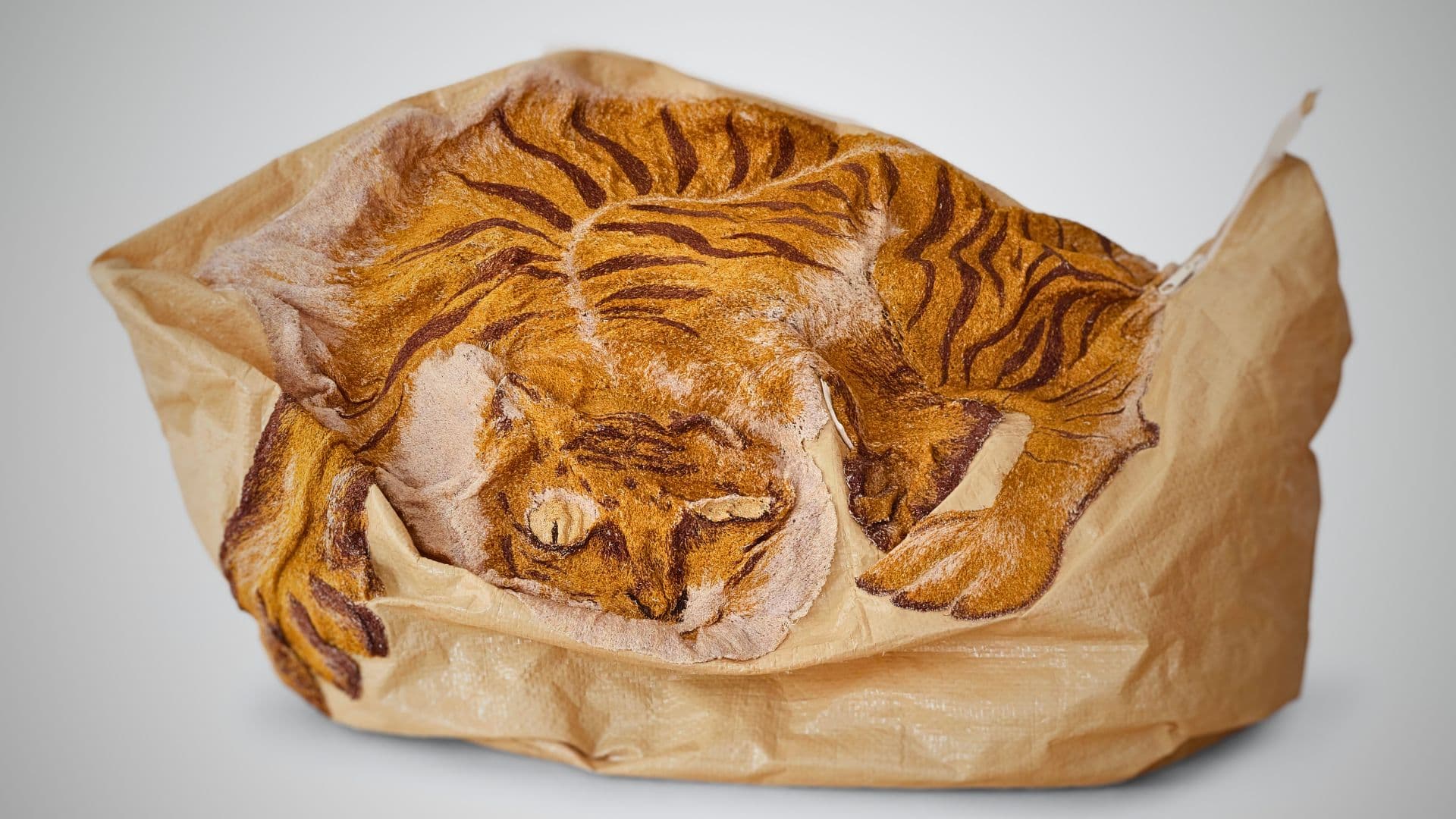 An IKEA bag with embroidered with a Tiger design. 