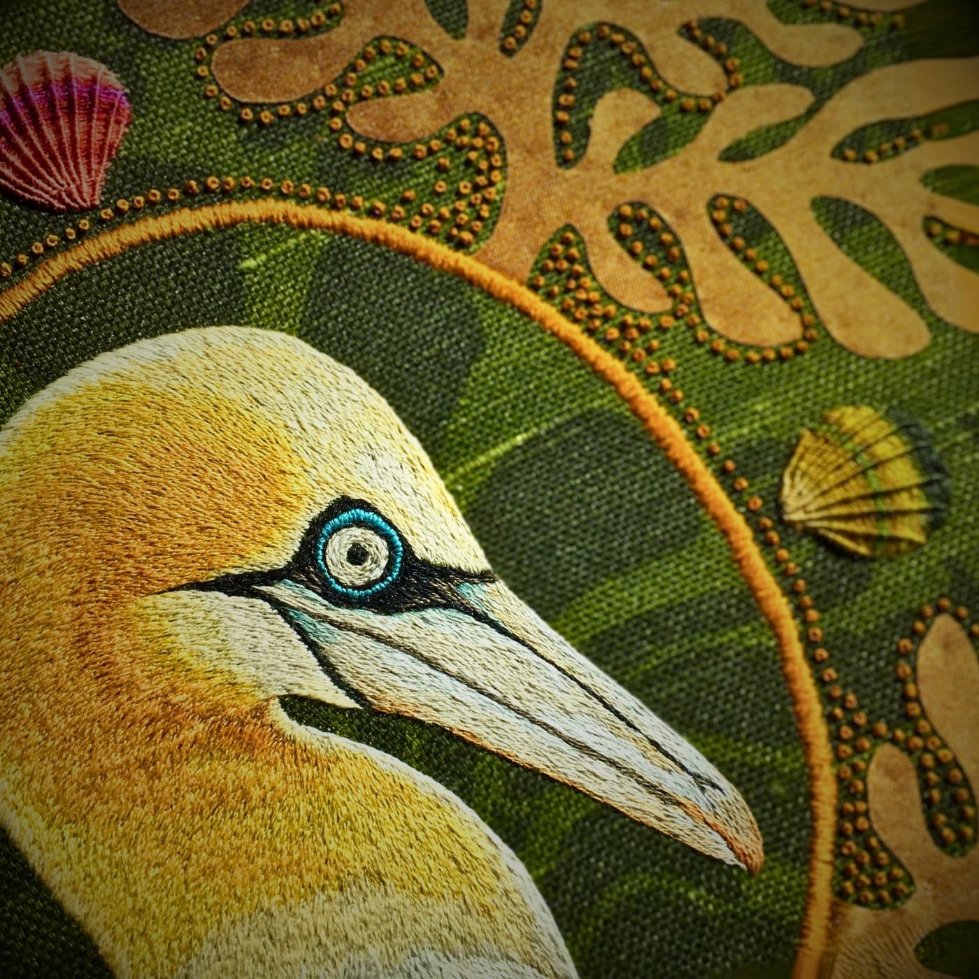 a bird embroidered on a fabric