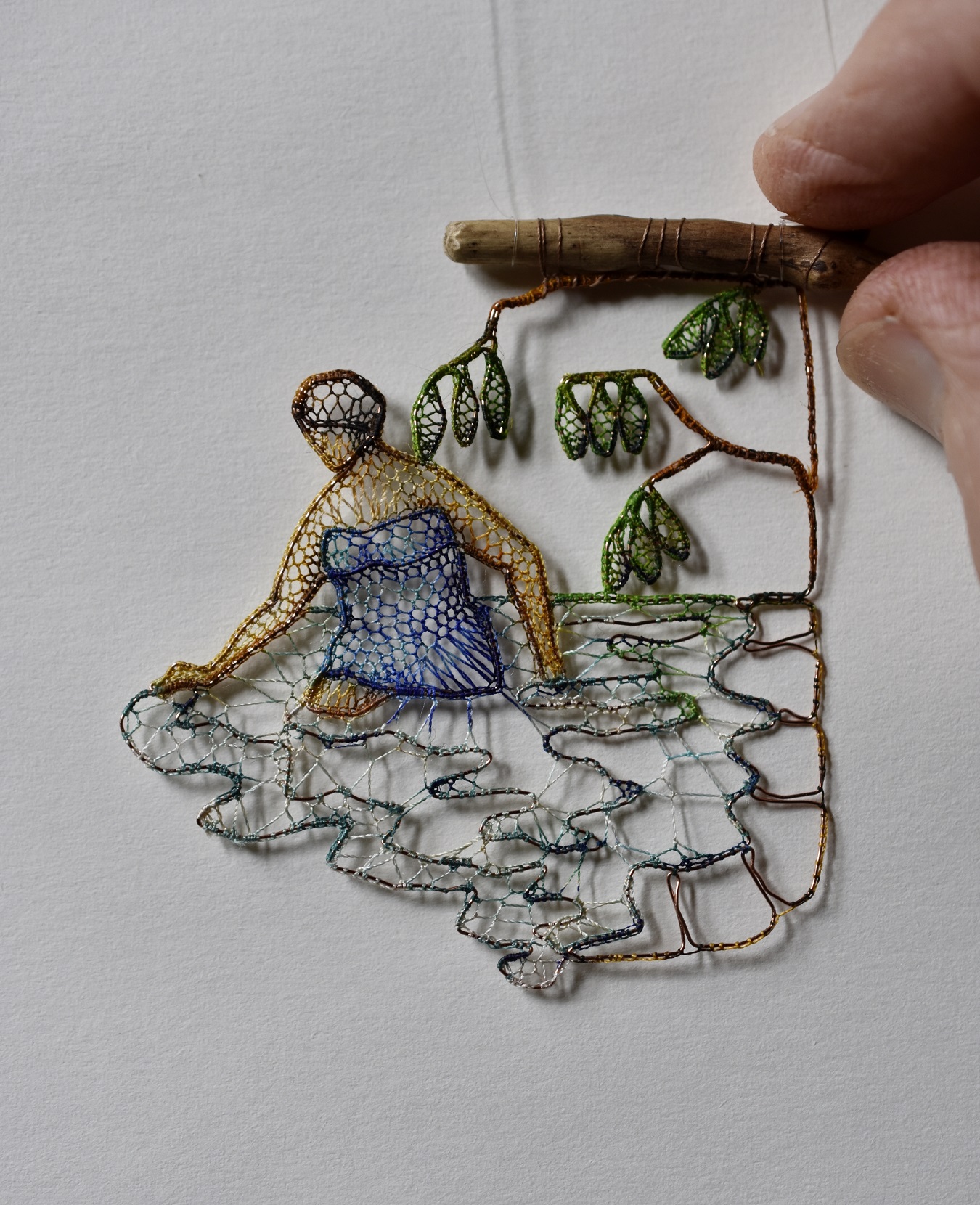 Agnes Herczeg: The bath, 2019, 5 cm high, Needle lace with copper wire contour, combined with poplar branch. Hand painted