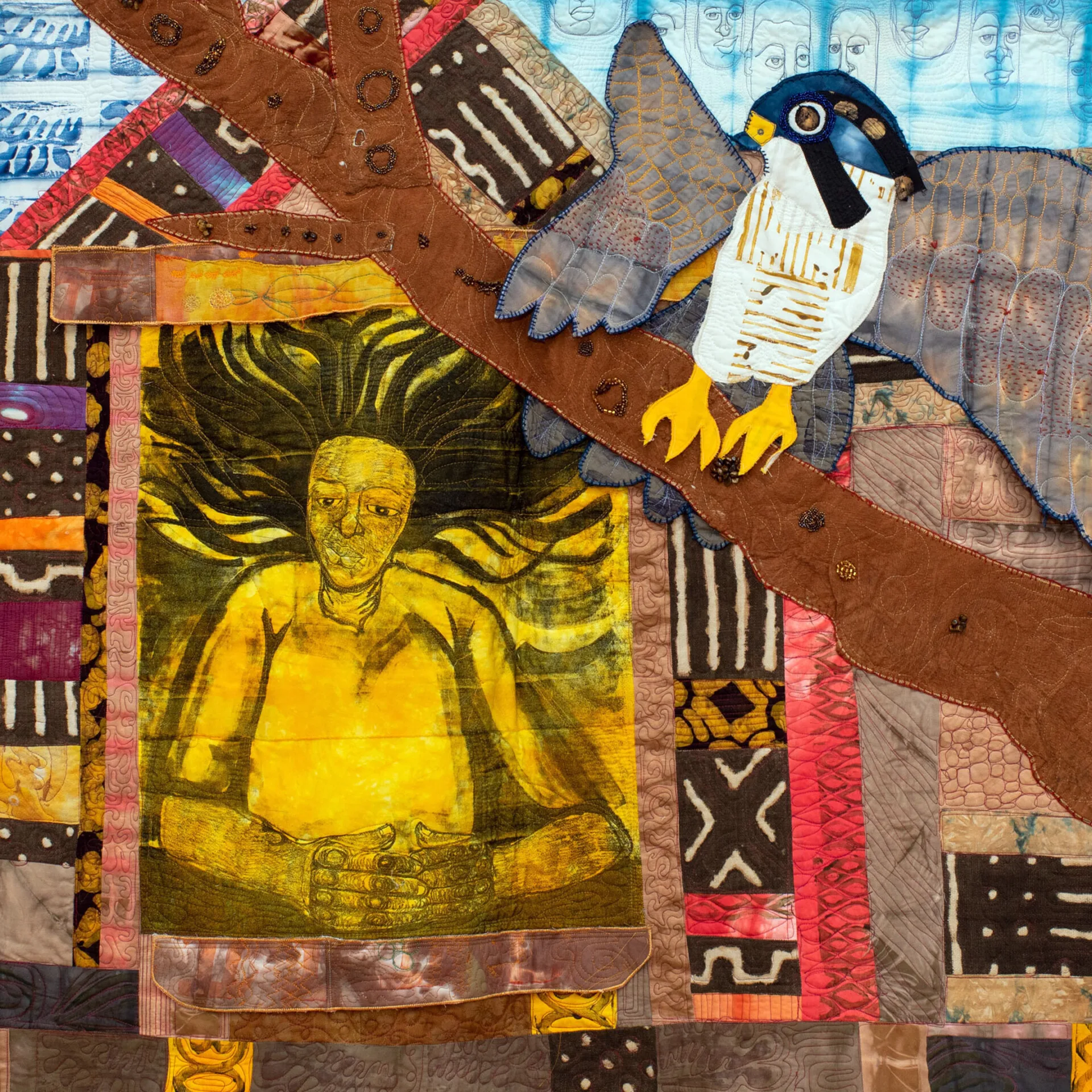 Lauren Austin, The Ancestors Named You Horus, 2020. 117cm x 112 (46" x 44"). Stone lithography, beading, hand dyeing, machine quilt drawing, machine quilting, appliqué. Bark cloth, mud cloth, adire cloth.