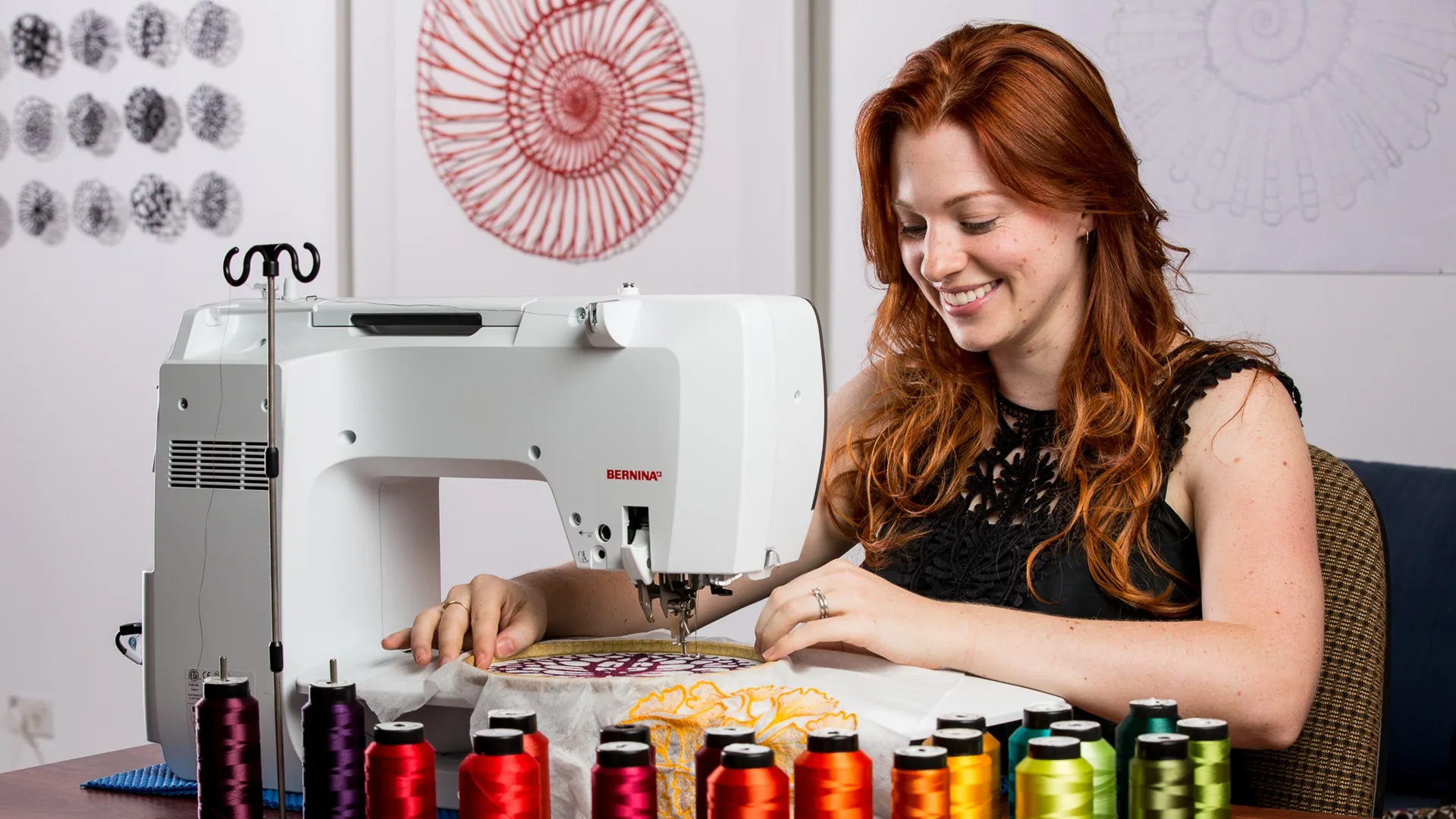 Meredith Woolnough sewing in her studio on her Bernina 710 sewing machine.