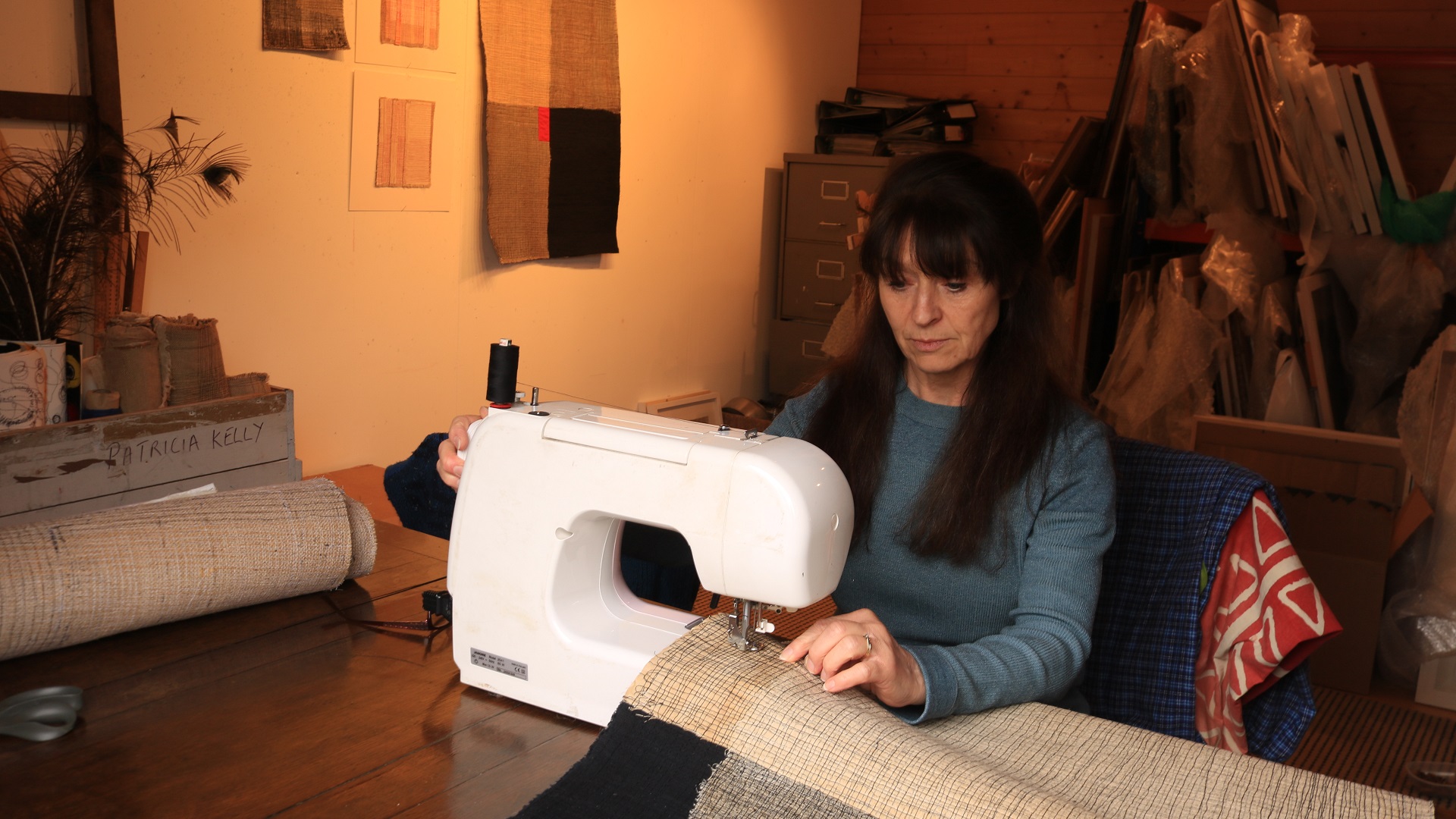 Patricia Kelly working in her studio.